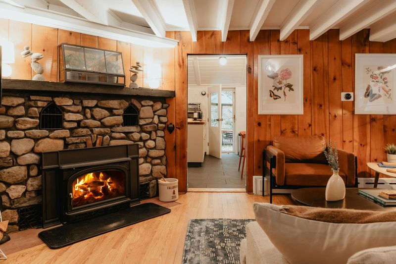 A fireplace and a chair