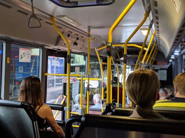 Inside a crowded  bus 